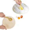 The bread proofing kit includes a 9-inch round and a 10-inch oval proofing basket, and a set of baking tools including a bread knife, dough scraper